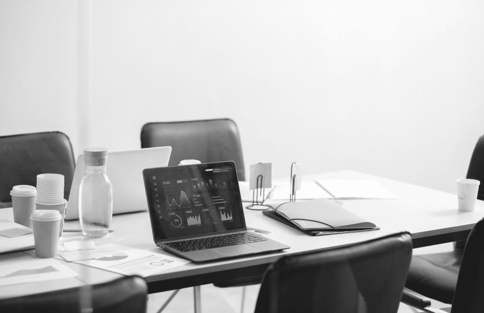 Student working through technical troubleshooting scenario on dual monitors in training lab