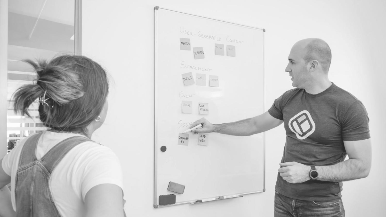 Team member providing technical support and troubleshooting